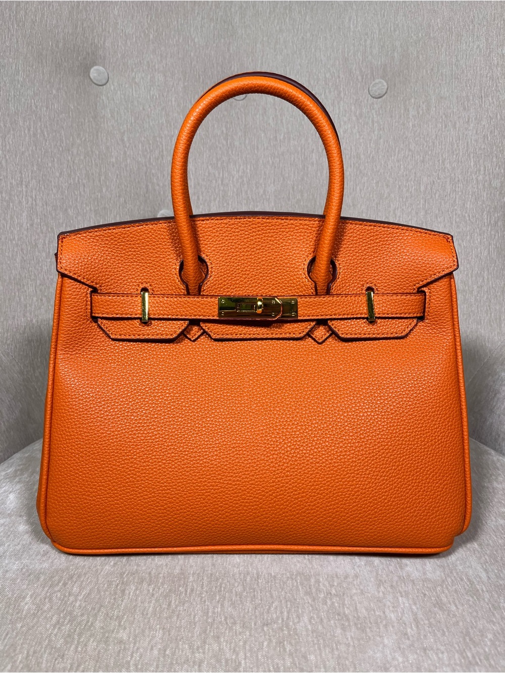 Elegant Orange Leather Top-Handle Satchel